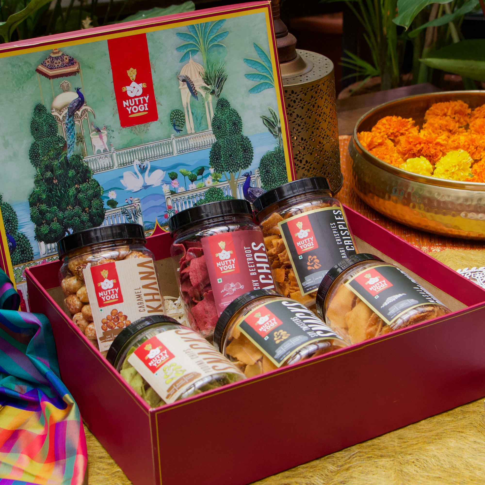 Nutty Yogi Festival Gift Pack for Family, Friends | Festive Gifting |Corporate Gifting I Healthy Snacks, Premium, Gift Hamper | (Ragi Bhujiya) | (Chatpata Magic Pops) | (Gud Chana) | (Beetroot Bhujiya) | (Pudina Chips) | ( Smoked Caramel Makhana)