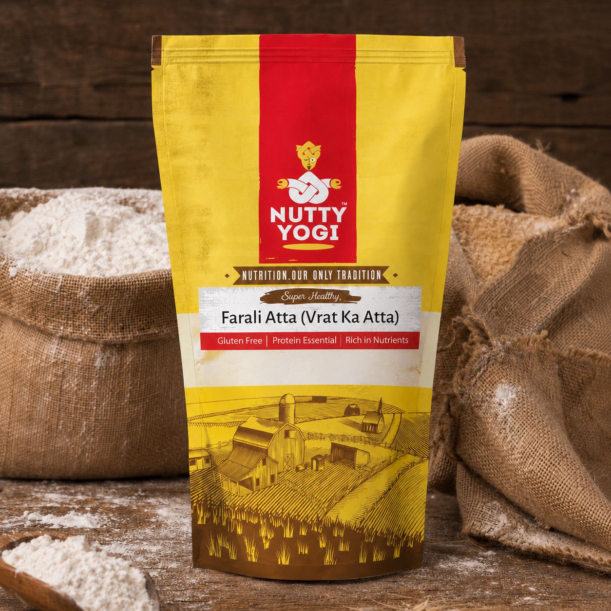 Nutty Yogi Farali Atta (Vrat Ka Atta) displayed on a rustic wooden surface beside sacks of flour, highlighting a gluten-free, protein-rich flour blend for fasting and everyday recipes.