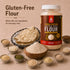 Jar of Nutty Yogi Power Protein Gluten Free Flour with gluten-free flour and rotis on a beige background